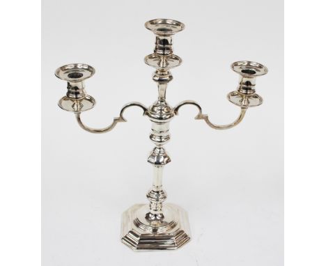 A modern, 18th century style three light silver candelabrum (filled), maker Adie Brothers, Birmingham 1961  