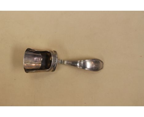 An early nineteenth century Dutch silver tea caddy shovel, 0.833 standard c1834, 0.31 ozt / 9.7 g approx