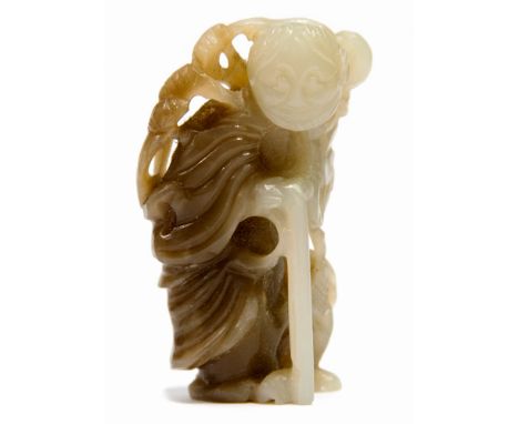 A Chinese jade carving of a figure, the old man holding a stick, 6cm