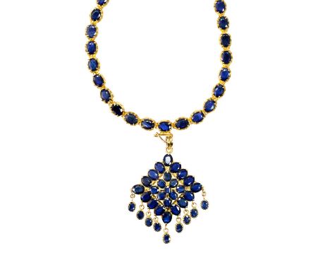A continental sapphire necklace, with pendant set with numerous oval cut sapphires