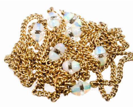 A yellow metal opal and rock crystal fine link necklace, the links interspersed with eight opal beads of egg shape with rock 