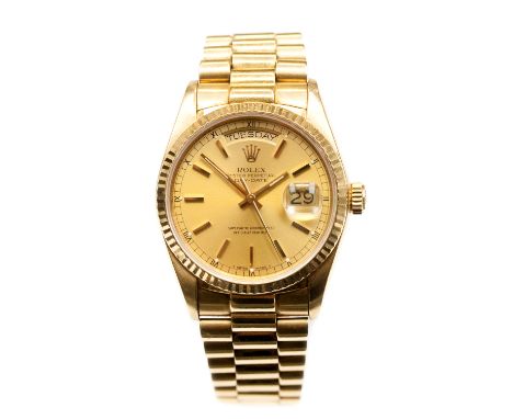 Rolex, a boxed gents 18k gold Rolex Oyster Perpetual Day Date Superlative Chronometer, 3.5cm dial, model No.18038, B/Let No.8