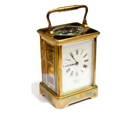A French repeating brass carriage clock, early 20th century, corniche case, white enamel dial with Roman numerals, Finnigans 