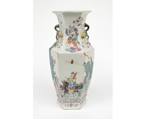 A Chinese famille rose hexagonal section twin handled baluster vase, probably 19th century, decorated with deity figures view