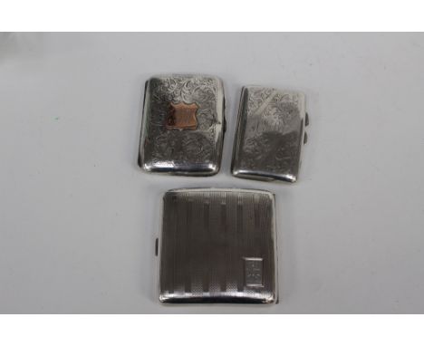 A George V silver cigarette case with engine turned decoration, Birmingham 1929, together with another George V silver cigare