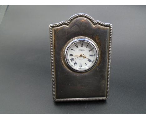 A Silver Framed table clock - Sheffield 1994 by R Carr. working order (needs new battery)