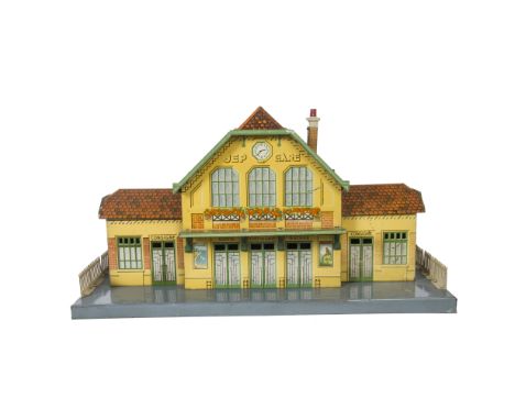 A JEP O Gauge Large Station, finely printed with yellow-rendered and red-brick walls, and green 'woodwork', with 'Art Deco' d