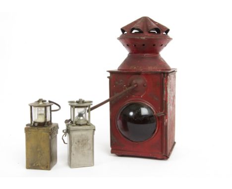 Railway Lantern and Two Others, a vintage lantern of square form painted red with two red lenses stamped R.E. and L.M.S. on t