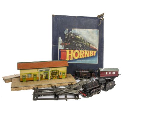 A Hornby O Gauge Clockwork No 50 Goods Train Set and Additional Items, the set containing BR black 0-4-0 Locomotive no 60199 