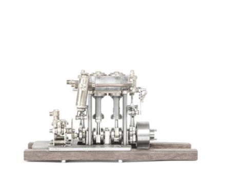 A Vertical Twin-Cylinder Marine-type Steam Engine, mounted on hexagonal pillars with monobloc cylinders, lubricator to Steam 