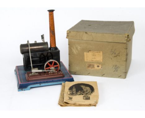 A Boxed Bing 10/128/1 Spirit-Fired Stationary Steam Engine,  with 4" long boiler, small oscillating cylinder, 2" diameter fly