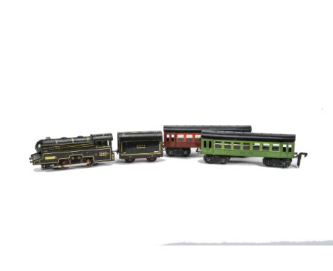 An Uncommon Express Gils (Belgium) O Gauge 3-rail Steam Locomotive and Coaches, the 0-4-0 loco and 4-wheeled Tender in lithog