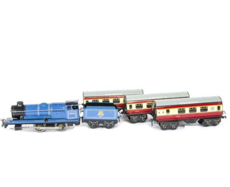 A Chad Valley O Gauge Clockwork 'Flying Scotsman' Train, with blue 4-4-0 Locomotive no 10138, Tender, two 'sausage' 1st class
