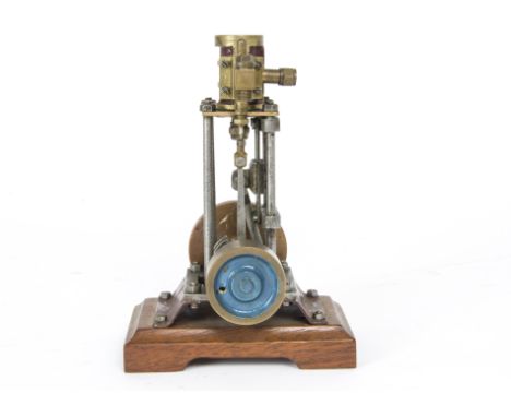 A Small Vertical Single-Cylinder Steam Engine by J E Hatton, with cast brass cylinder, mounted on pillars, overall height on 