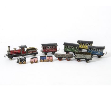 Hess Penny Toy Trains, red engine No 100, red, yellow, blue and green coaches all No 100, open truck and chassis and roof, F-