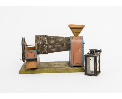 An Uncommon Steam-driven Toy Grading Machine by unknown maker, featuring a horizontal perforated tapered drum, with hopper-po