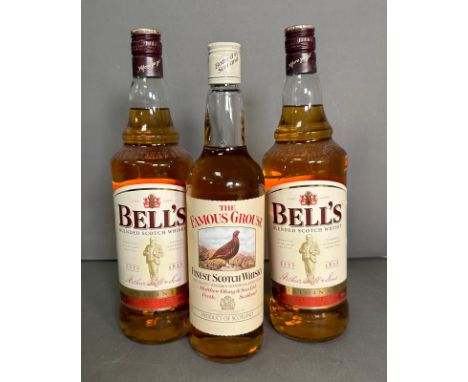 Two bottles of Bells blended Scotch whiskey and a bottle of the famous Grouse 