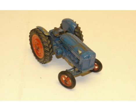A Chad Valley Fordson Major Tractor, in blue livery with rubber tyres, F, play worn  