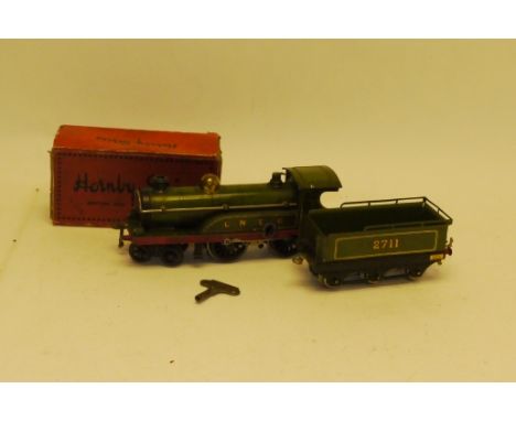 A Hornby O Gauge Clockwork No 2 Locomotive and Tender, a 4-4-0 in LNER green, F-G, mech tested ok but governor ineffective, t
