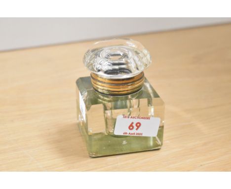 An early 20th century cut glass inkwell having yellow metal collar, h8cm