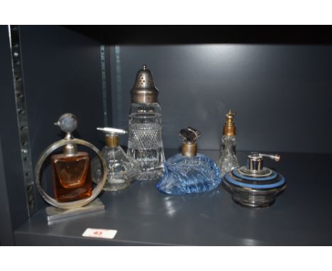 An Art Deco style glass perfume bottle having circular chrome surround, pat no. 281719 to base, h12.5cm, sold together with v