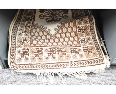 A pair of wool runner rugs having central diamond bordered with geometrical patterns, L142cm