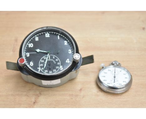 A vintage military aviation cockpit clock having black dial with luminous hands, h8.5cm, sold together with a Nero Lemania po