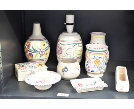 A Poole pottery table lamp decorated having foliage patterns on a white ground, h16, sold together with a Poole pottery vase,