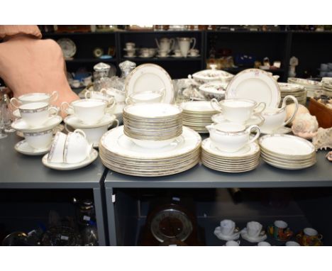 A Wedgwood Colchester pattern bone China tea service, decorated with gilt edging and geometric designs on a white ground, to 