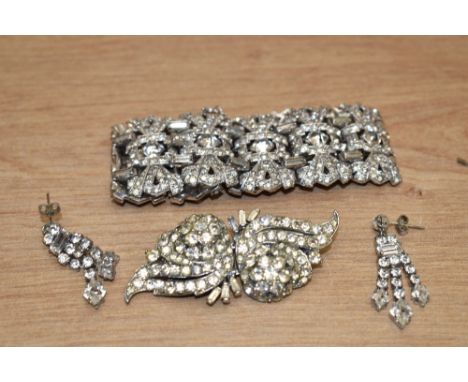 A paste set white metal Art Deco style bracelet, brooch and earring set