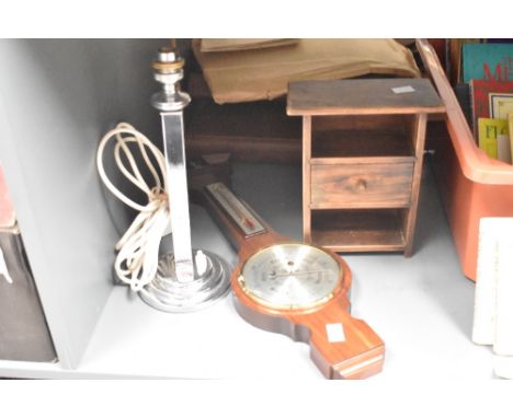 A vintage chrome column lamp supported on a three step base, h32cm, sold together with a barometer and miniature chest of dra