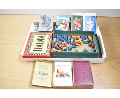 A pack of new bond playing cards, sold together with various other playing cards and chess pieces ect