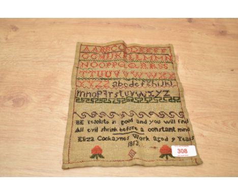 An early 19th century needlework alphabet sampler, worked in polychrome threads by Eliza Cookaynes, aged 9, 1813, unframed 25