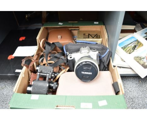 A Canon E05 300 with carry case, sold together with various vintage binoculars ect, (7)