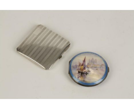 AN AMERICAN SILVER AND GUILLOCHE ENAMEL LADIES COMPACT of circular form, the cover depicting boats on a lake, stamped Sterlin
