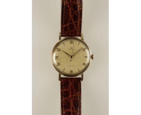 ROLEX: A GENTLEMANS YELLOW GOLD WRISTWATCH, the round dial with Arabic and baton numerals, sweep seconds hand, inscribed "Rol