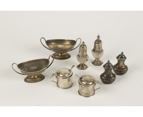 A PAIR OF SMALL MUSTARD POTS by William Hutton & Sons, Birmingham 1912, and a collection of condiments, mixed makers and date