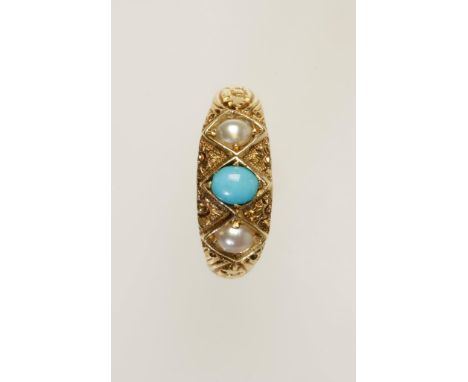 A TURQUOISE AND PEARL THREE STONE DRESS RING, the oval-cut turquoise flanked by two cultured pearls, on an engraved setting, 