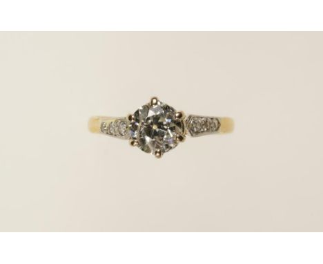 A DIAMOND RING, the brilliant-cut diamond c.0.85cts, on a yellow gold shank with diamond shoulders, circa 1930 (ring size K-L