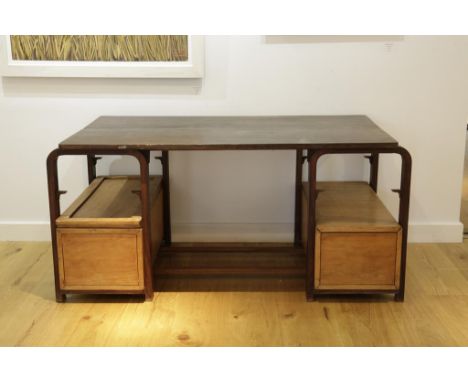 AN ART DECO STYLE HARDWOOD DESK, the rectangular top on twin pedestals with rounded uprights, open shelf and short drawers in