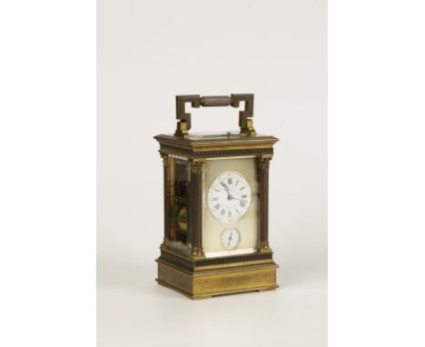 A FRENCH BRASS CASED REPEATING CARRIAGE CLOCK, the white enamel dial with Roman numerals and outer Arabic numerals, inscribed
