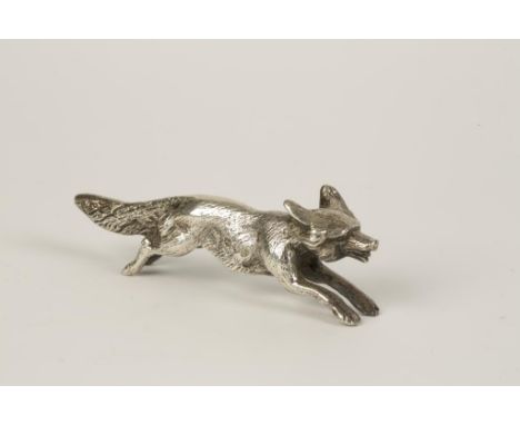 A VICTORIAN MODEL OF A RUNNING FOX by Edward Hutton, London 1890, 3.75" long (13oz). See illustration