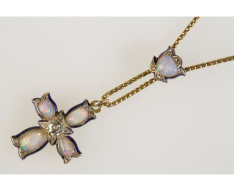 A VICTORIAN BLUE ENAMEL CROSS PENDANT set with opals and a diamond circa 0.20ct to the centre, attached to the original chain