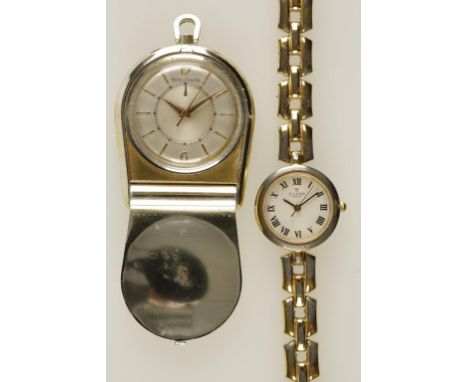 JAEGER-LECOULTRE: A LADIES WHITE METAL PURSE WATCH, the dial with baton and Arabic numerals, sweep seconds hand, inscribed "J