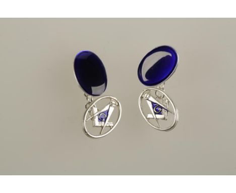 A PAIR OF SILVER AND BLUE ENAMEL MASONIC CUFFLINKS, one side decorated with the compass and square 