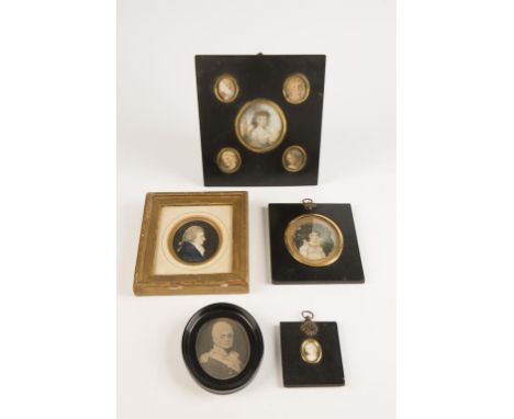 ENGLISH SCHOOL, 19th century A portrait miniature family group depicting five ladies, in a wooden ebonised frame with gilt me
