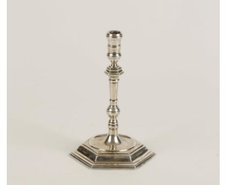 A GEORGE I STYLE TAPER STICK with knopped stem and hexagonal base, by Thomas Bradbury &amp; Sons Ltd, London 1912, 4.5" high 