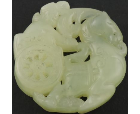 A Chinese circular green jade pendant, Dia:5cm