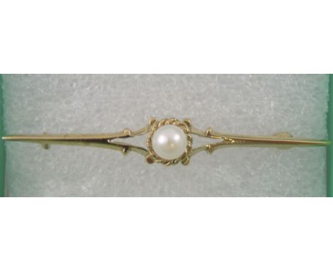 A Victorian 9ct gold and pearl set bar brooch, 1892