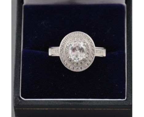 A silver and cubic zirconia dress ring